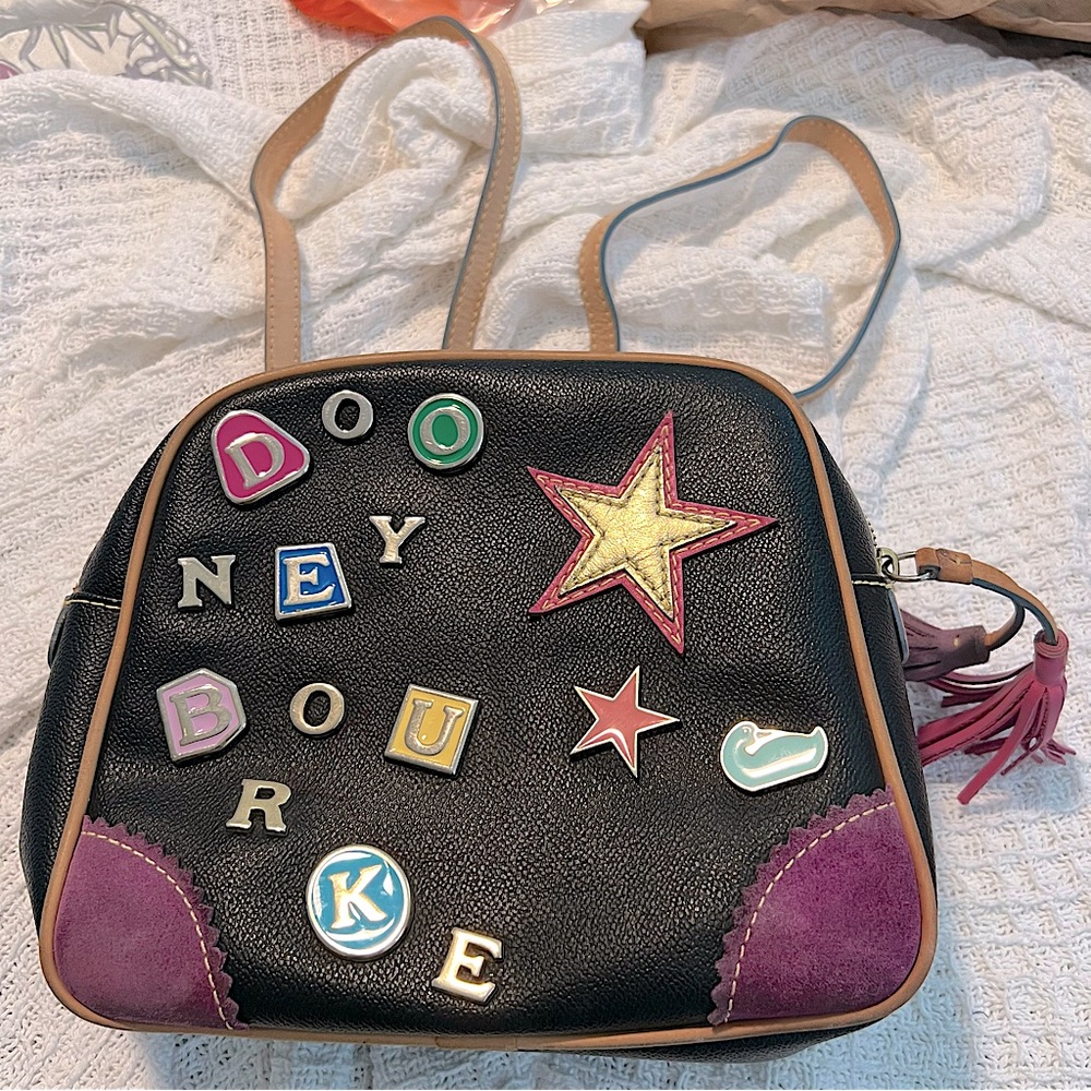 free shipping with full price offer rare Dooney Bourke CHARMS BACKPACK